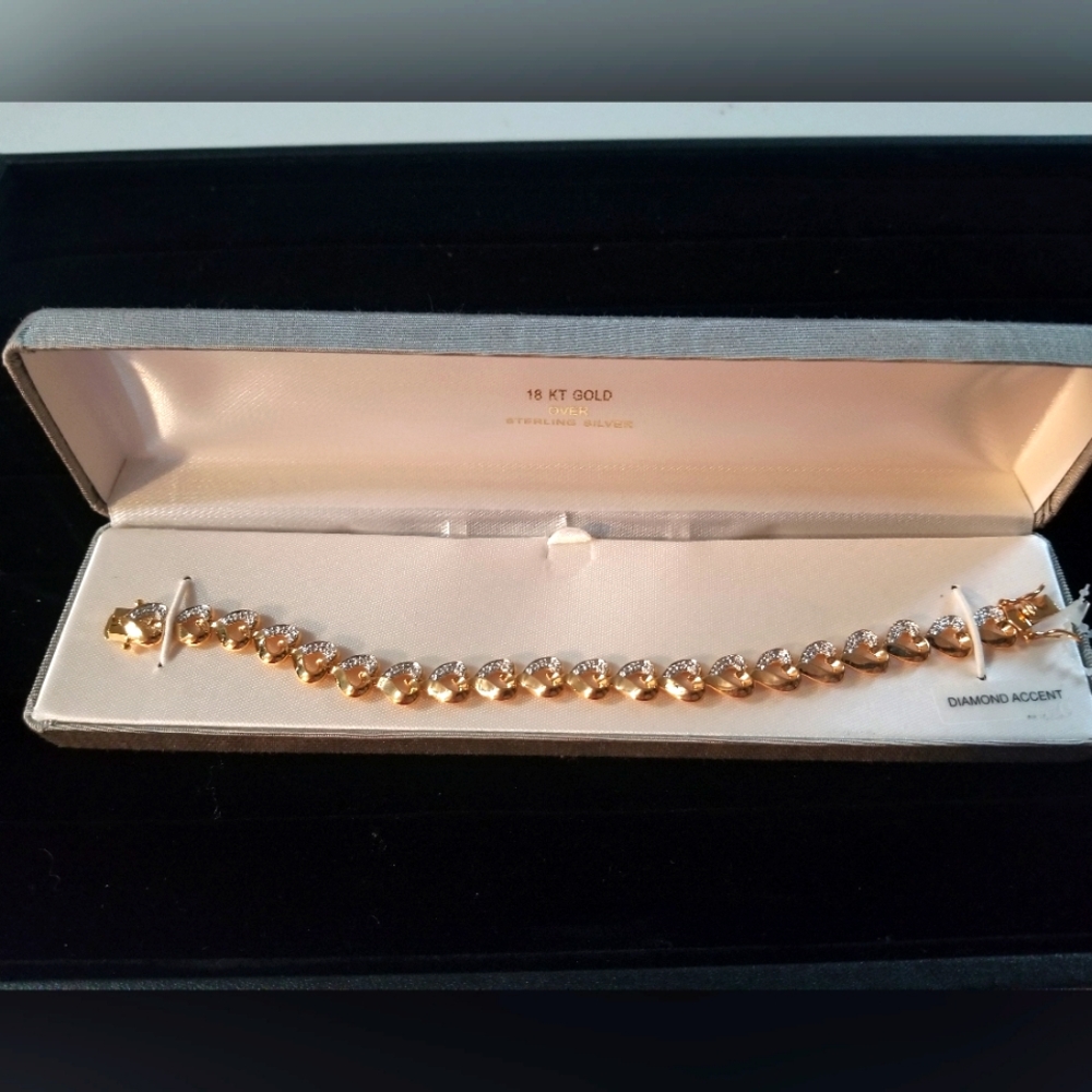 Gold over silver heart bracelet with diamonds
